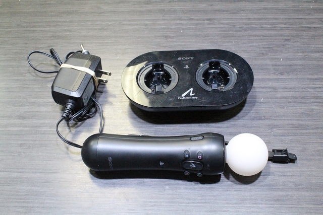 1 manette move ps3 + chargeur